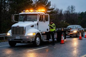 Professional towing service arriving for roadside assistance